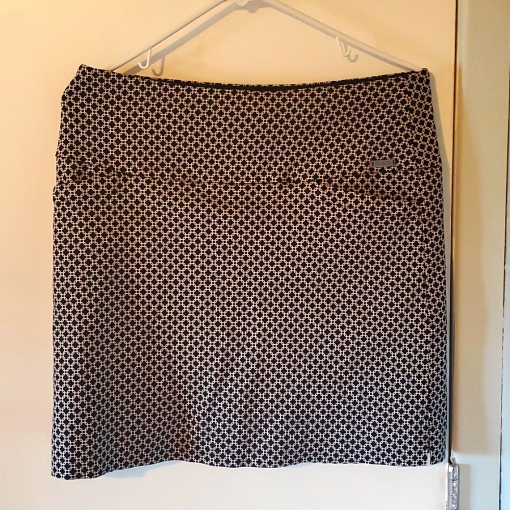 Athletic skirt with shorts underneath  hold you in fabric for a sleek fit